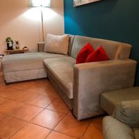 Divano letto contenitore con penisola