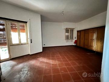 Piano terra con giardino