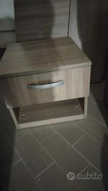 letto singolo e comodino