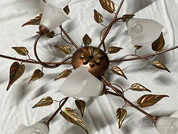 Lampadario in ferro battuto e calle