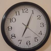 Orologio nero da parete