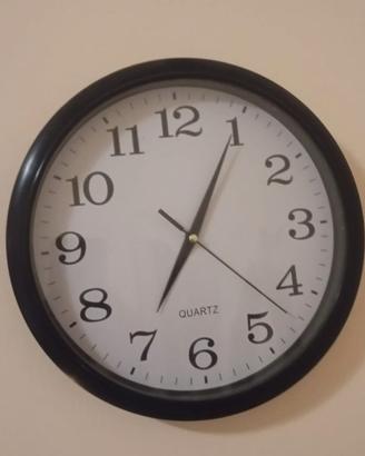 Orologio nero da parete