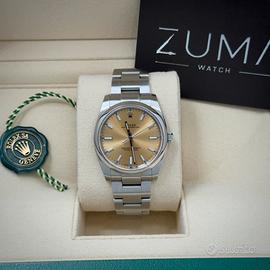 Rolex Oyster Perpetual 114200 34mm Champagne