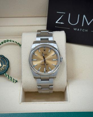 Rolex Oyster Perpetual 114200 34mm Champagne