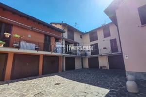LOMAZZO: Ampio trilocale in centro paese con canti
