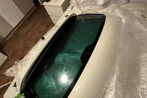 Portellone posteriore scirocco liscio con spoiler
