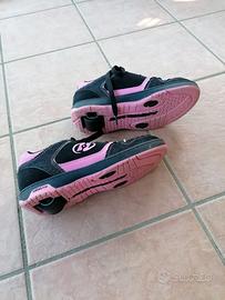 Scarpe heels con ruote