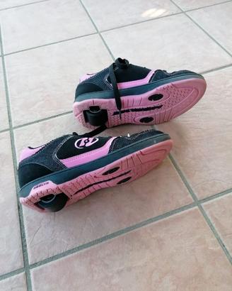 Scarpe heels con ruote