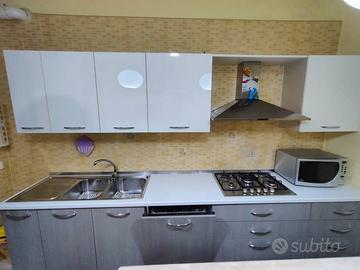 Cucina accessoriata 4.5m + Parete attrezzata 3m