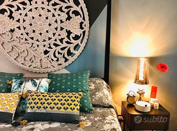 Capezzale rotondo intagliato intarsiato legno