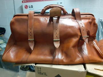 Borsoni da viaggio  in cuoio 