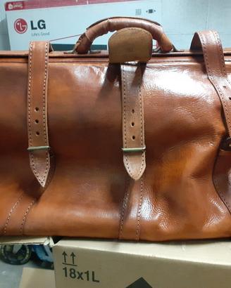 Borsoni da viaggio  in cuoio 