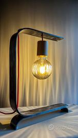 Lampada in acciaio di design artigianale