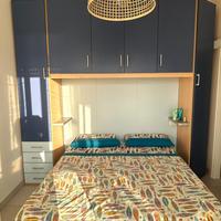 Parete attrezzata camera matrimoniale