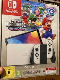 Nintendo switch oled + 2 giochi