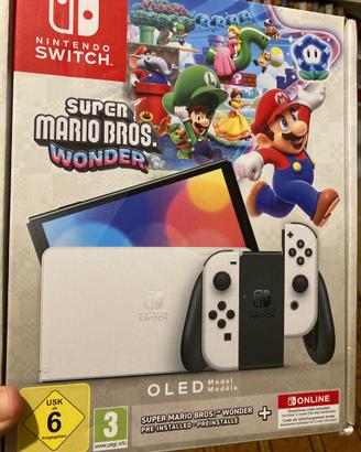 Nintendo switch oled + 2 giochi