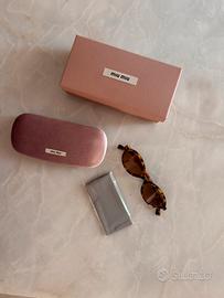occhiali da sole miu miu MU 04ZS