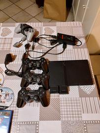 Ps2 + joystick+ giochi