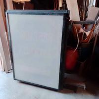 insegna luminosa bifacciale 