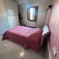 Letto rosa con materasso