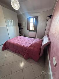 Letto rosa con materasso