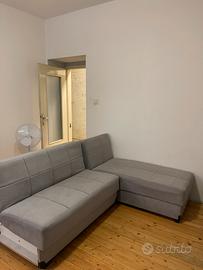 Divano angolare grigio