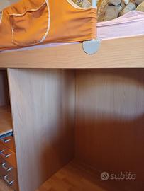 Camera da letto con soppalco