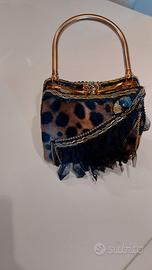 Clutch borsa gioiello in cavallino maculato 