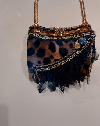 Clutch borsa gioiello in cavallino maculato 