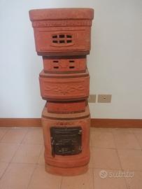 Stufa in terracotta anni 20 con cammello