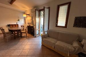 Bilocale con terrazza e resede