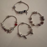 Pandora 4 bracciali argento + 30 charms