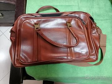 Borsoni di vario genere marrone, grigio e verdone