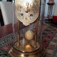 Orologio a pendolo campana di vetro