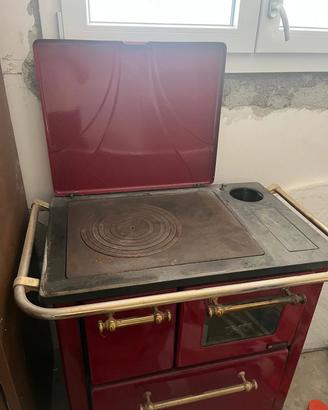 Stufa economica a legna con forno"
 
