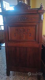 Testiera in legno di noce