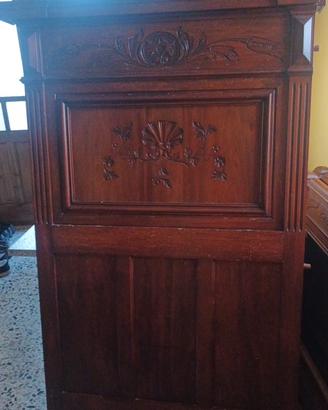 Testiera in legno di noce