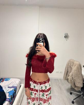 Top rosso glitter con dettaglio in piuma