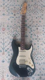 Chitarra elettrica con custodia e piedistallo