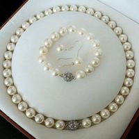 Parure collana bracciale orecchini perle NUOVA