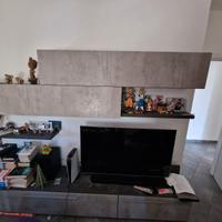 Soggiorno color ossido/cemento