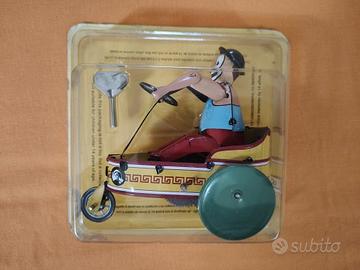 Gioco meccanico in latta