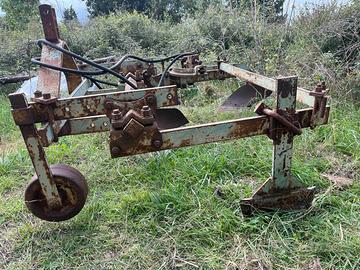 Scavallatore per cingolato a sollevatore