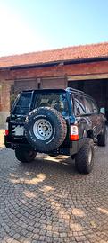 Paraurti posteriore uso gravoso Nissan Patrol Y61