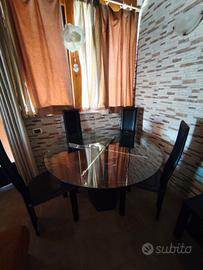 Tavolo Rotondo in Vetro + 4 Sedie in Pelle Nera