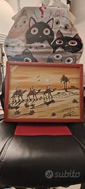 Quadro cammelli e deserto