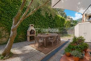 ACCOGLIENTE TRILOCALE CON AMPIO GIARDINO E BALCONE