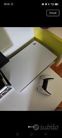 PlayStation 5 con disco e Joypad