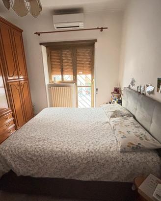 Letto matrimoniale contenitore grigio