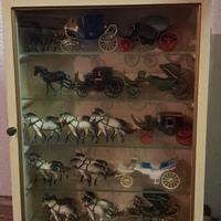 vetrinetta vintage con carrozze e cavalli